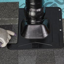 GAF contractor shingling around the Master Flow Pivot roof pipe boot.